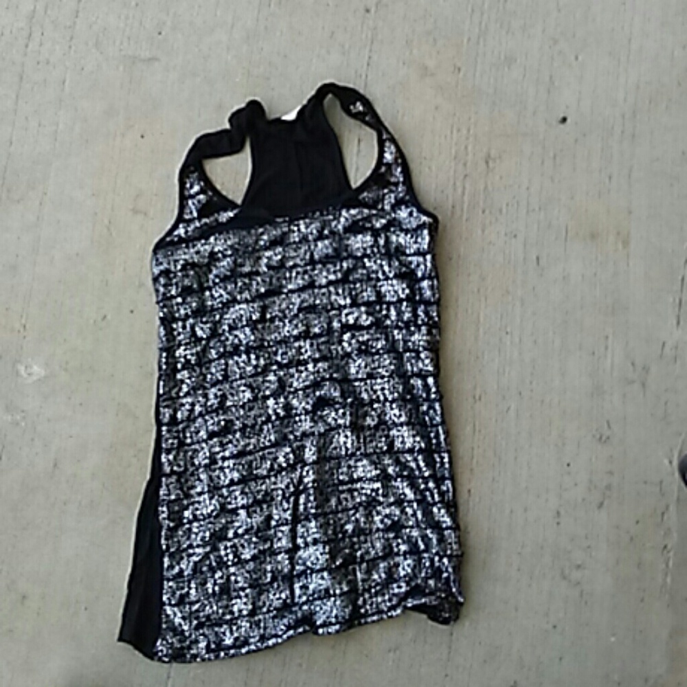 Silver and black tank